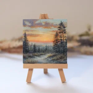 A delicate hand-painted acrylic miniature capturing a peaceful winter sunset over a quiet forest path