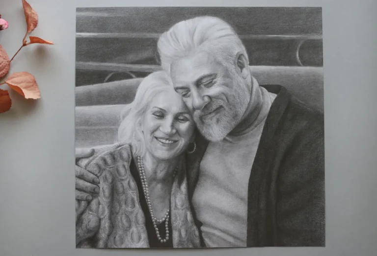 Hand-drawn graphite portrait of an elderly couple smiling together, custom family artwork