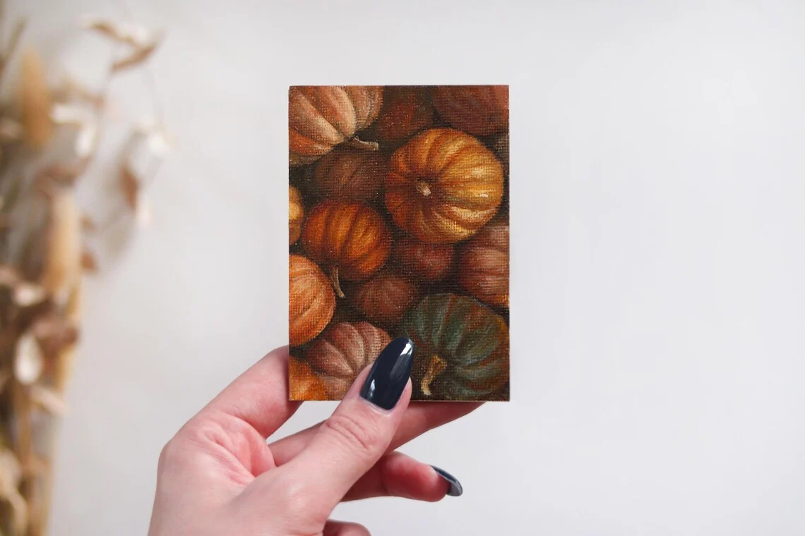 Size comparison of mini pumpkin acrylic painting 10x7cm, tiny collectible original artwork