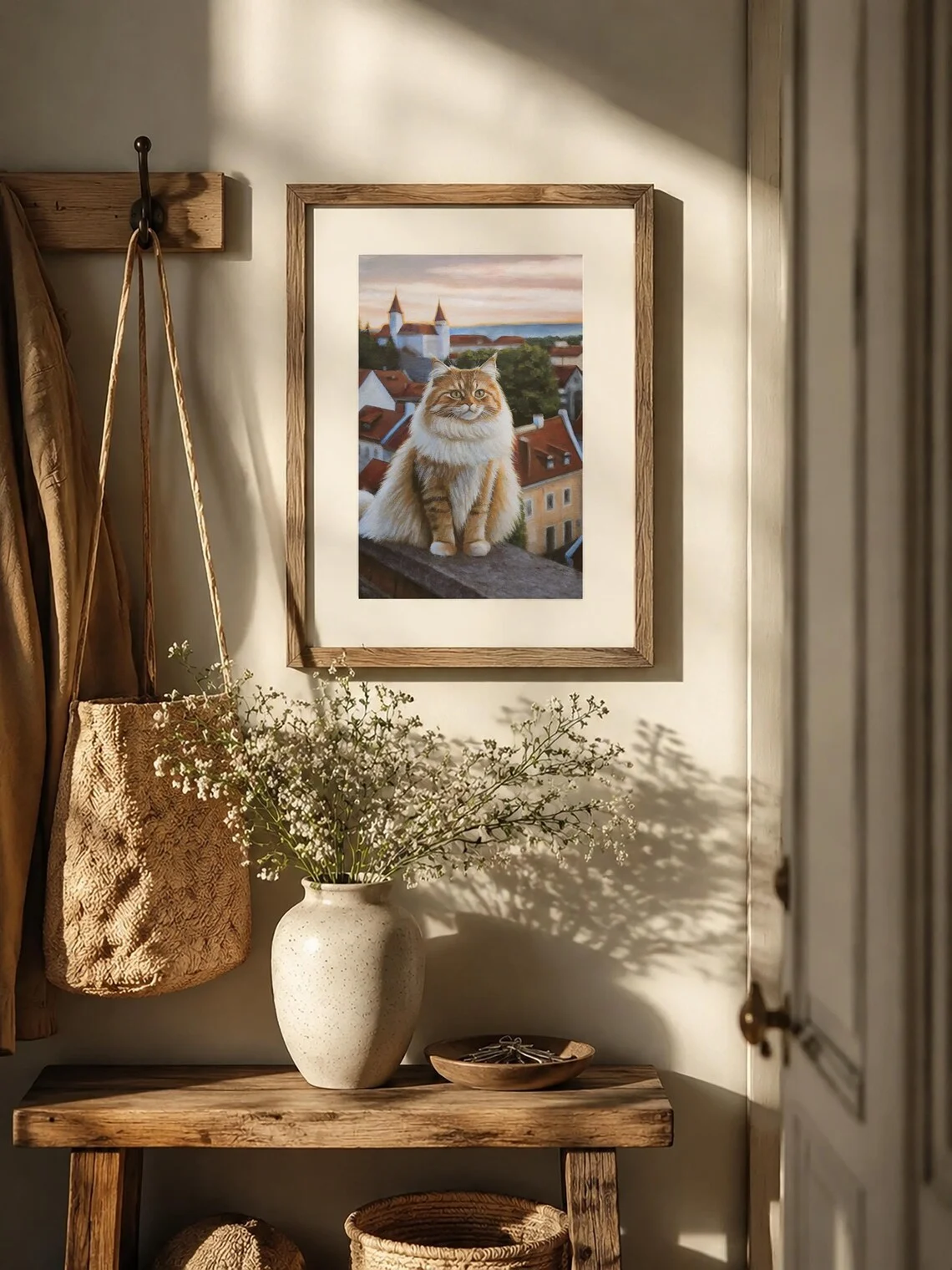 Ginger cat cityscape painting displayed on wall, original acrylic cat art for cozy home decor